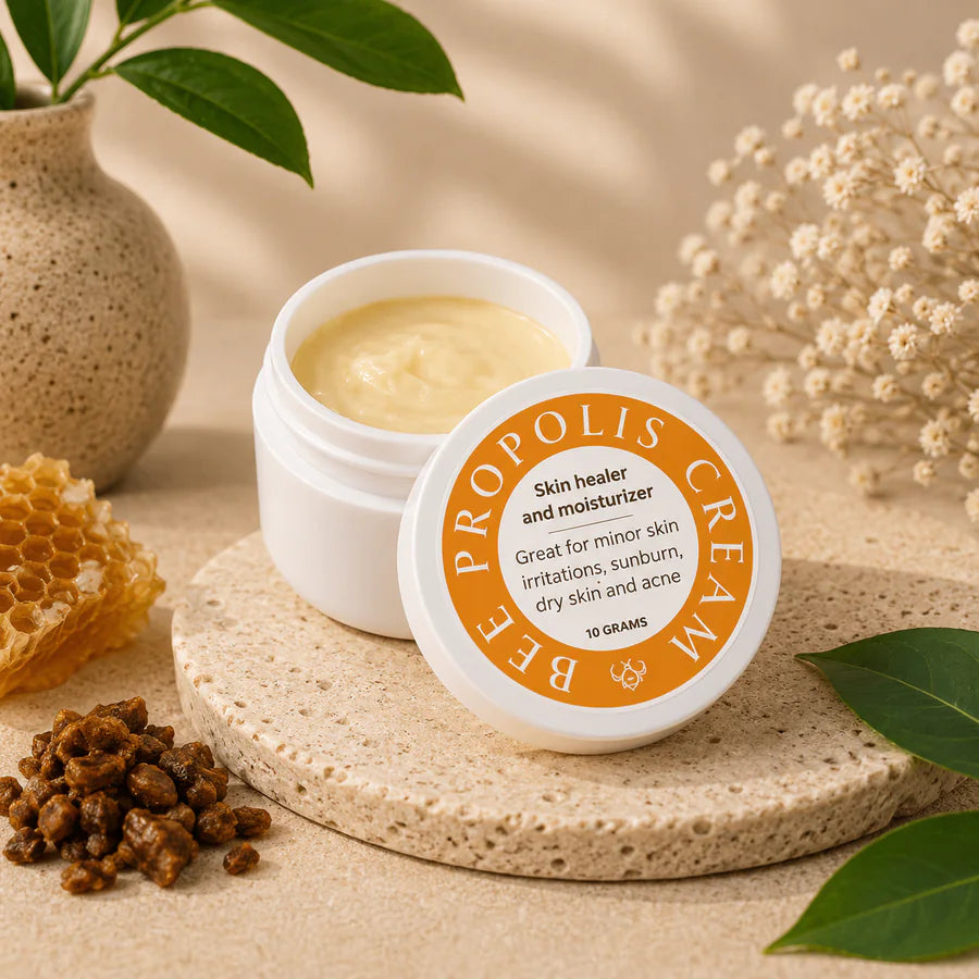 Open jar of Milea Bee Propolis Cream with its labeled lid